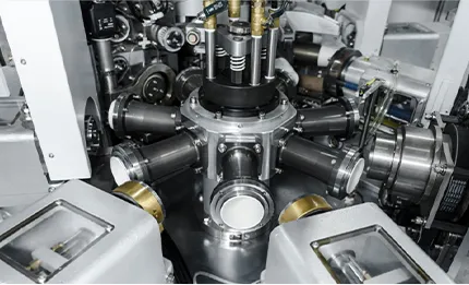 Close-up of quick-change die set being swapped on a cup forming line